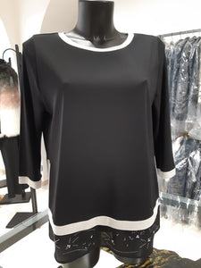 Maglia primaverile elegante da donna con taglie forti